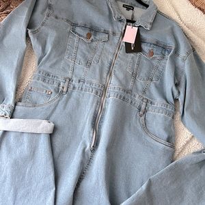 This is a denim long sleeve jumpsuit from PLT, never worn!